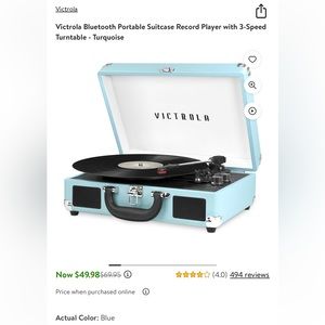 Victrola Turquoise Record Player. Like new, used a couple of times.